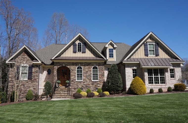 Welcoming suburban home representing residential real estate expertise