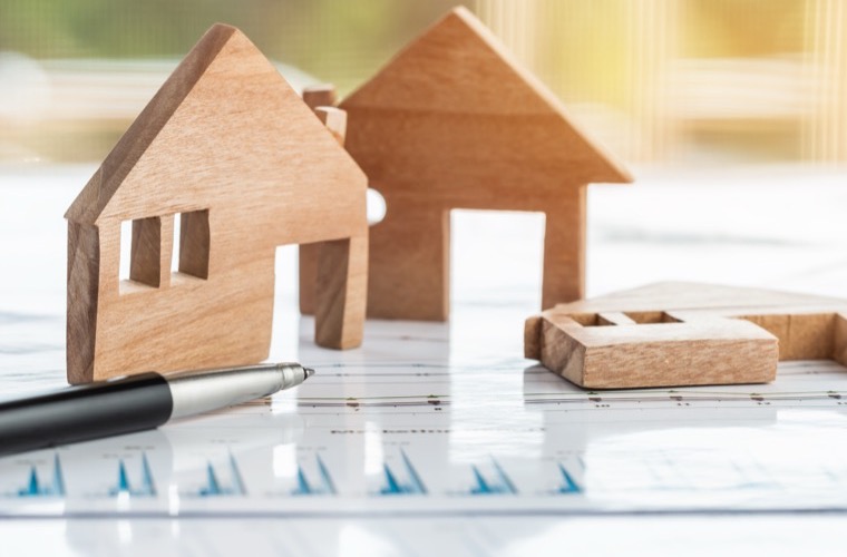 Property market report with charts and home models used to document value